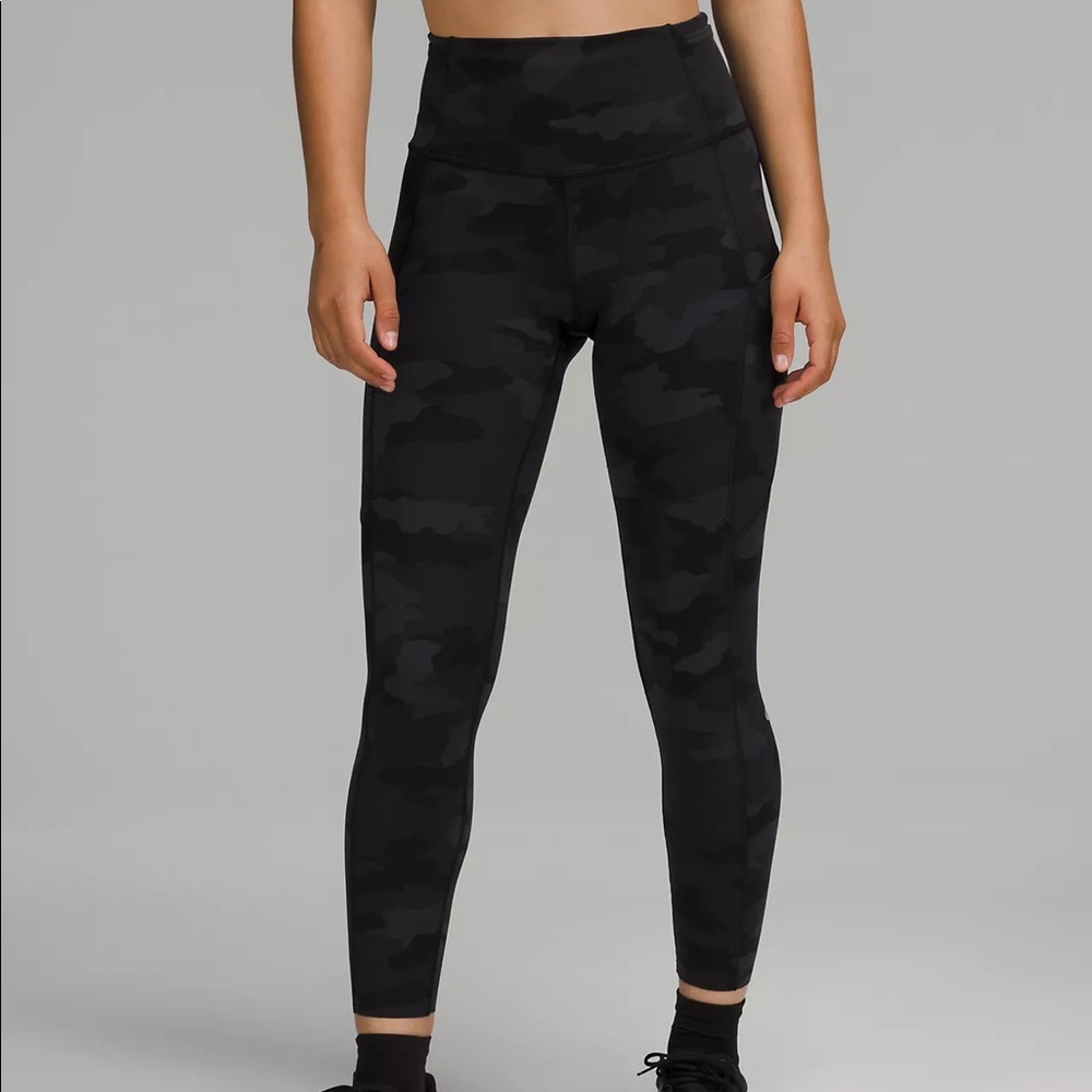 Lululemon Fast and Free Tights in color Heritage 365 Camo Deep Coal Multi